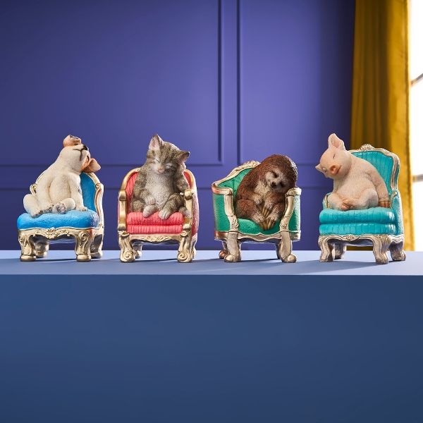 Hovedbilde Dovendyr som tar en lur i en lenestol