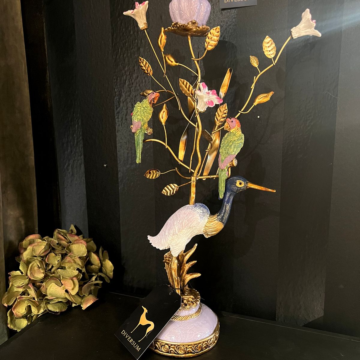 Lysestake med fugl Heron